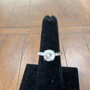 2 KT CUBIC ZIRCONIA RING IN WHITE GOLD-LIKE SETTING-SMALL CUBICS ON BAND.